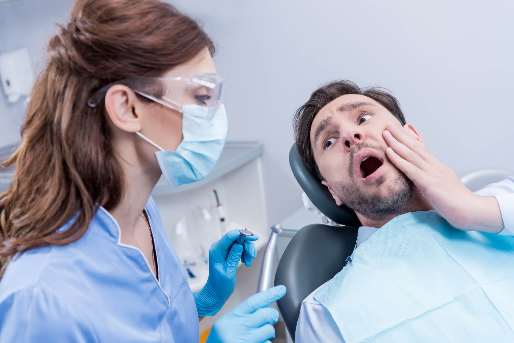 A scared man getting Dental Surgery 75075